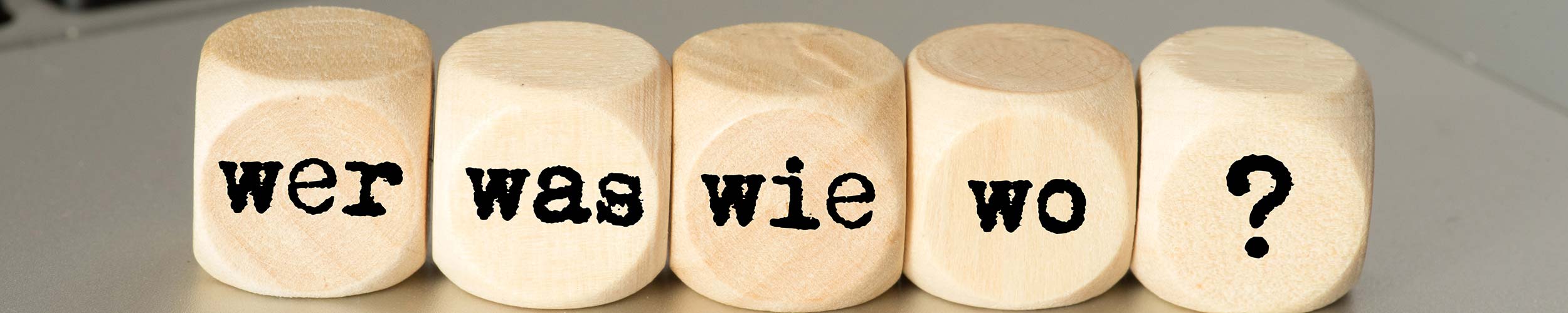 Bürgerservice der Stadt Ludwigsburg 5 Würfel mit den Worten wer wie wo was und einem Fragezeichen